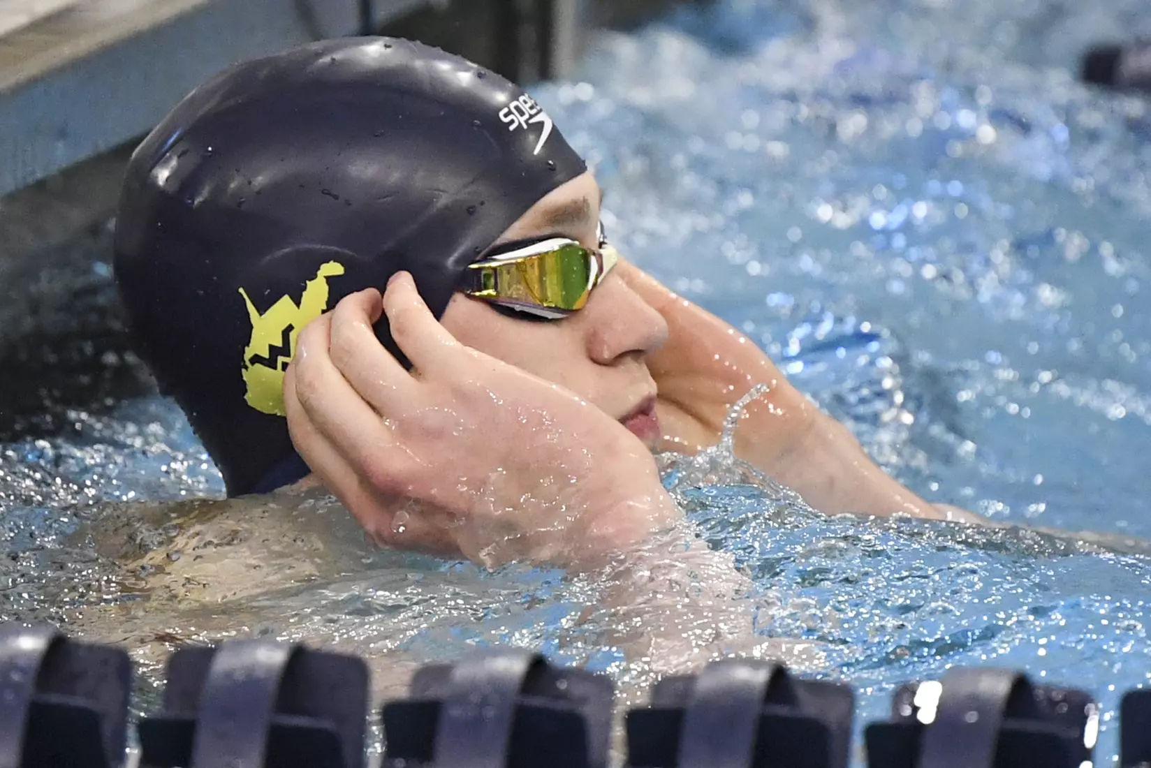 Hunter Armstrong finishes the 50 meter freestyle.