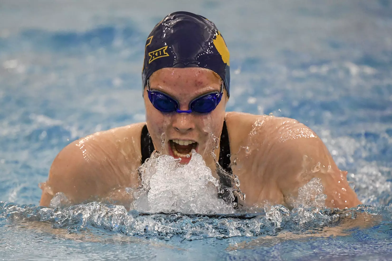 Mathilde Kaelbel does the breast stroke.