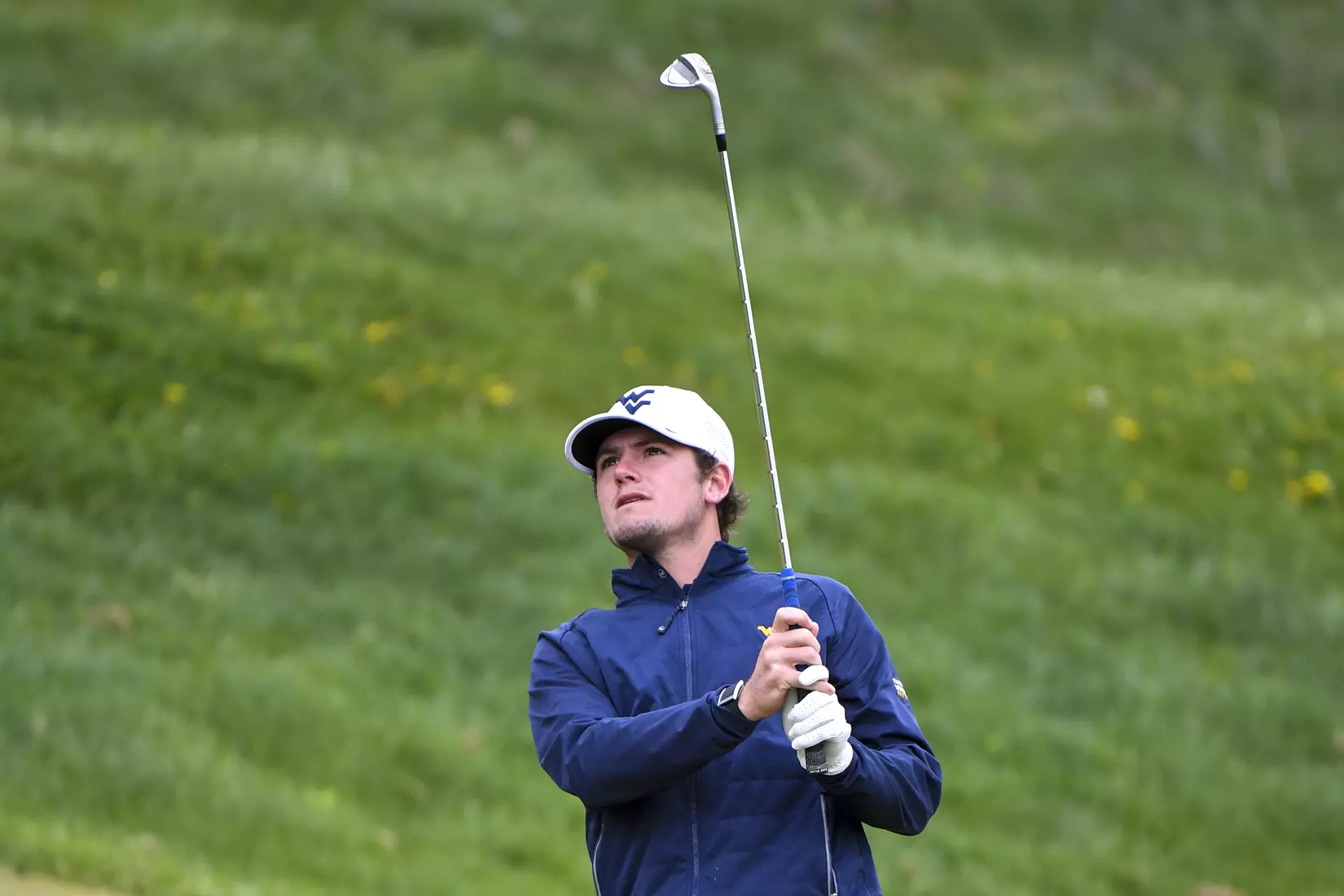 Logan Perkins watches his approach shot to six.