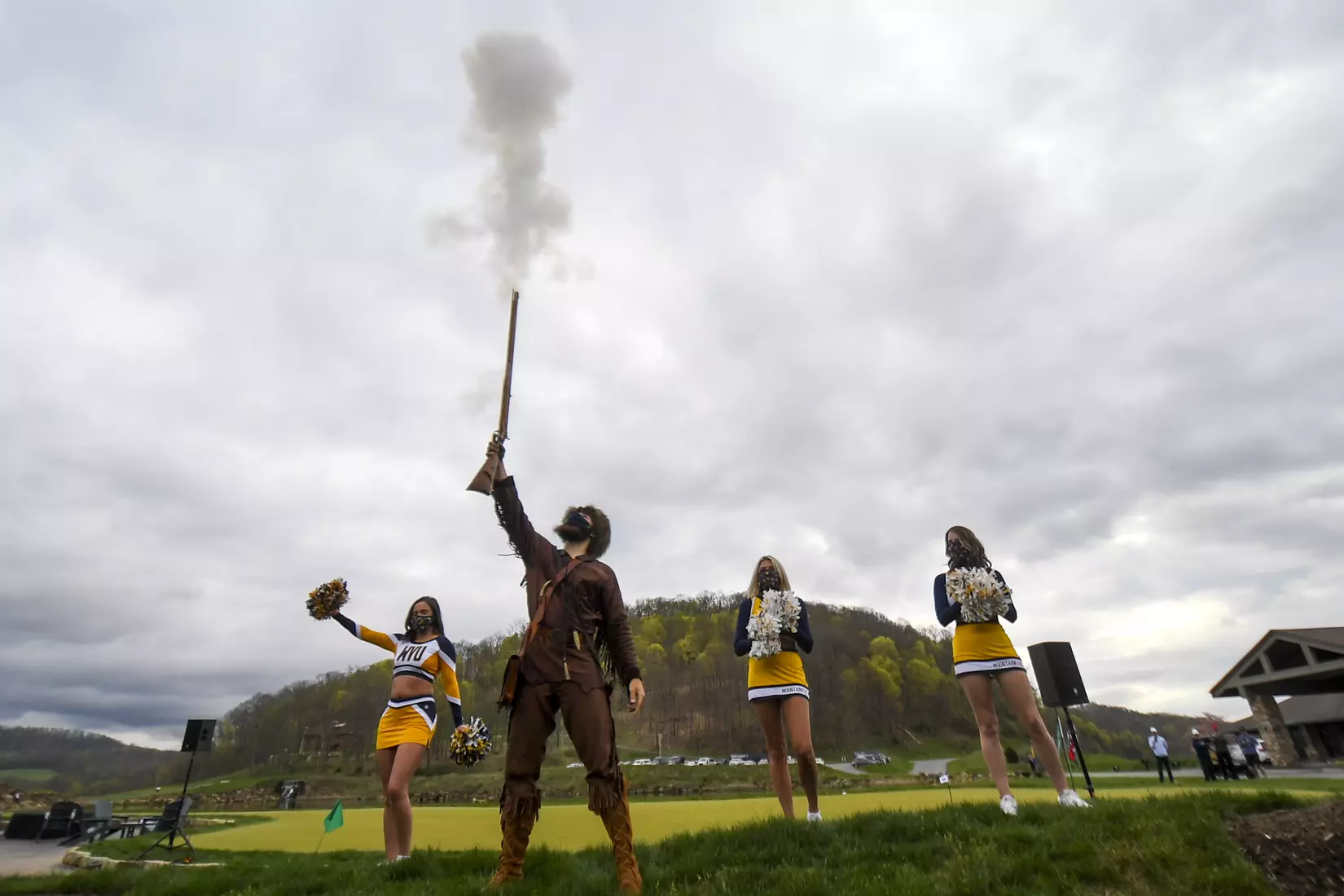 Mountaineer Colson Glover fires the musket to signal the start of the 2021 Mountaineer Invitational.