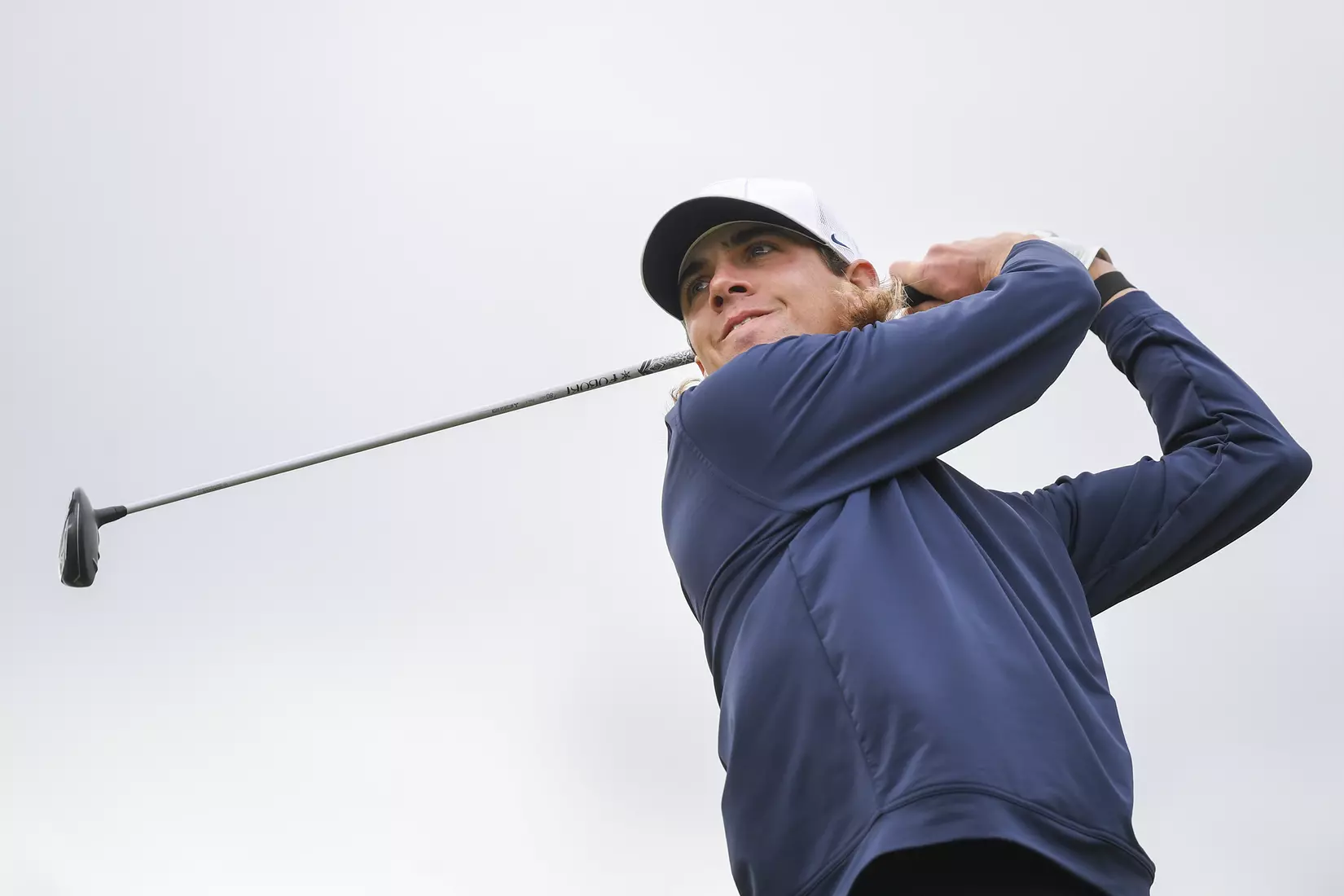 Mark Goetz tees-off on number one Monday morning.