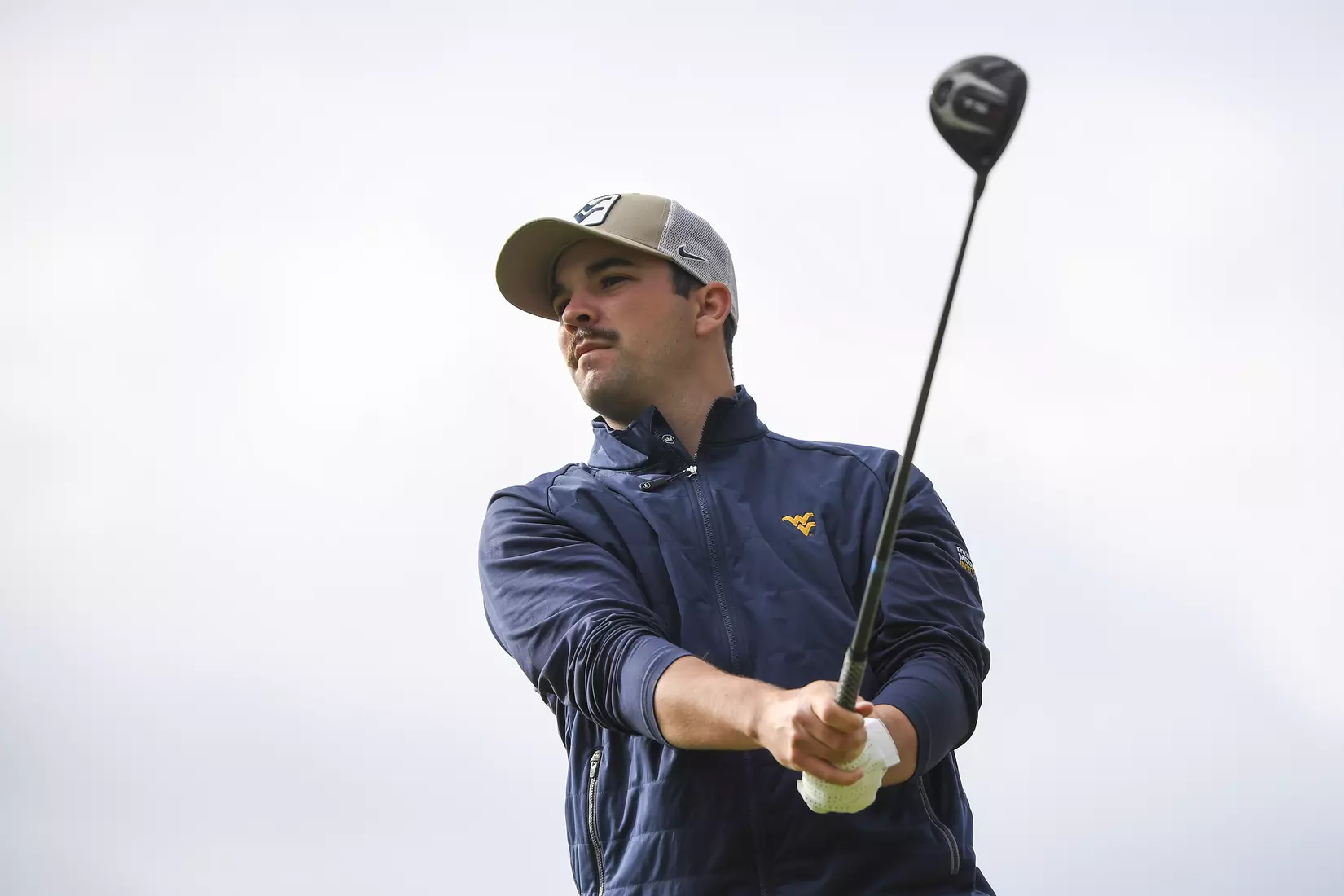 Etienne Papineau tees-off on number one Monday morning.