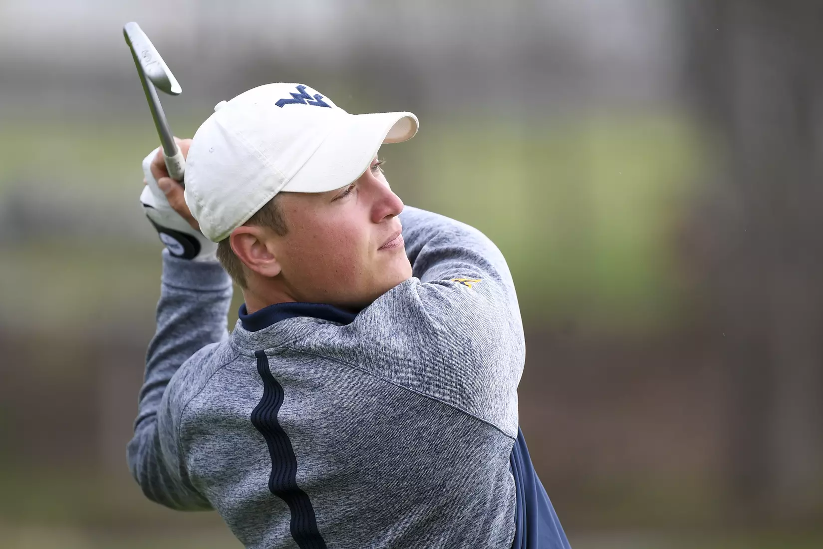 Kurtis Grant watches his tee shot.