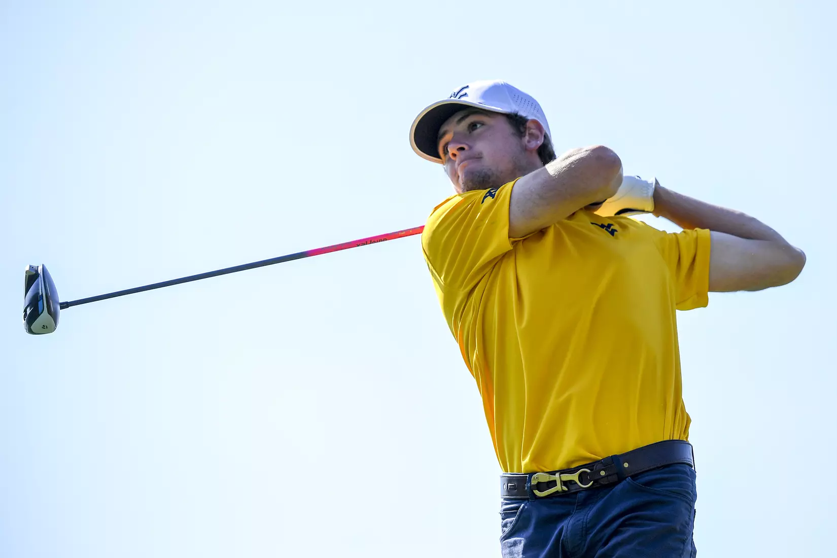 Logan Perkins follows-through on a tee shot.