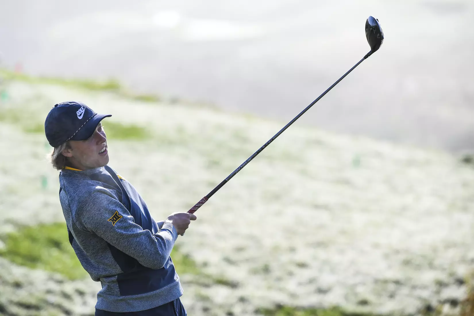 Oliver Menard tees off on number ten in the fog.