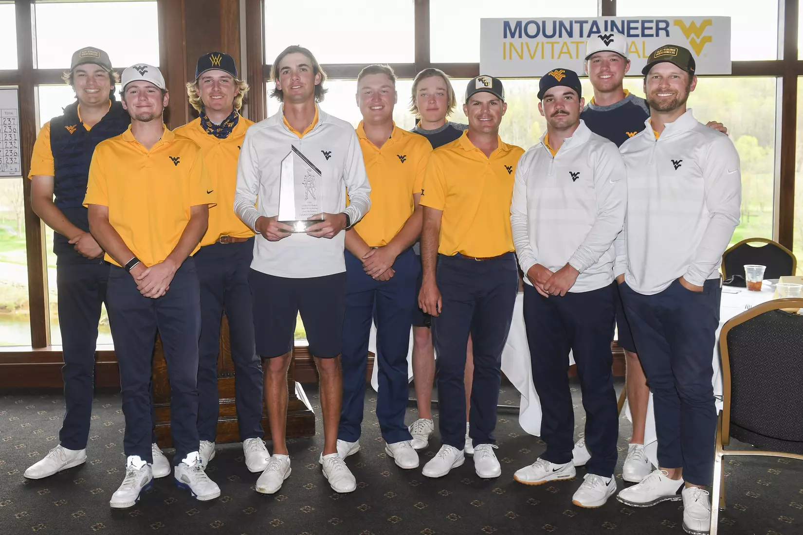 The Mountaineers take the Mountaineer Invitational champions trophy.