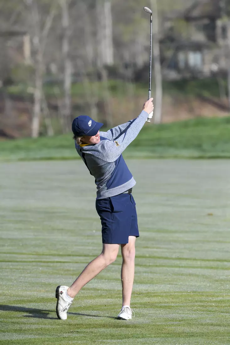 Oliver Menard hits a fairway shot.