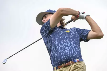 Jackson Davenport tees off on hole one.