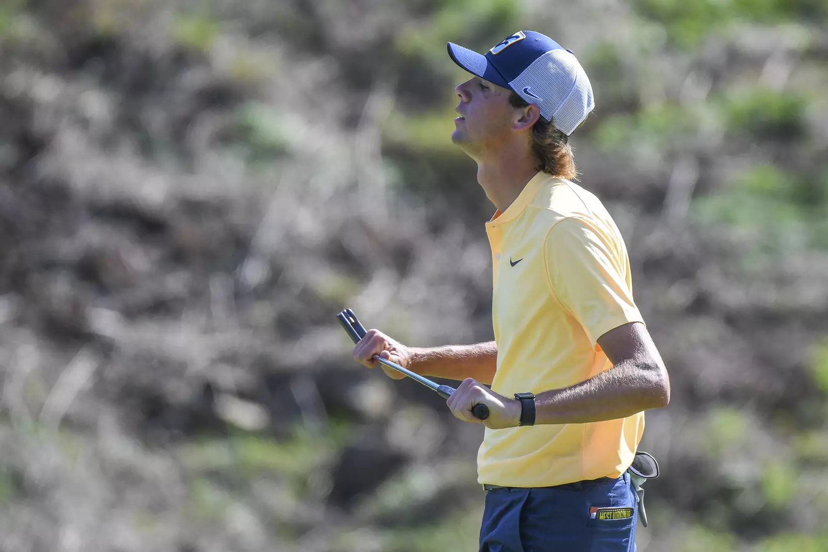 Mark Goetz reacts to a missed birdie putt on 18.