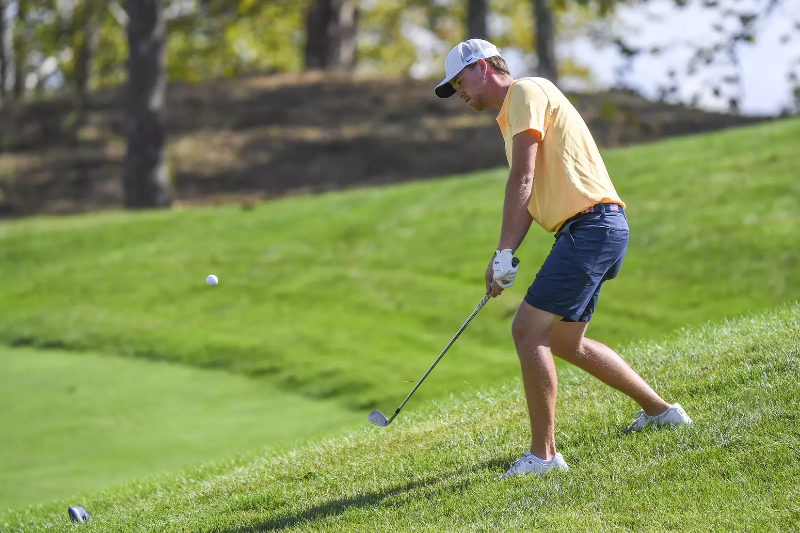 Trent Tipton chips on the 15th hole.