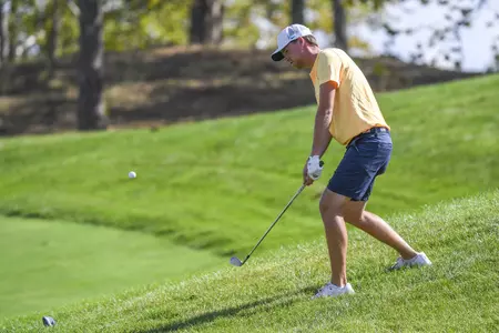 Trent Tipton chips on the 15th hole.