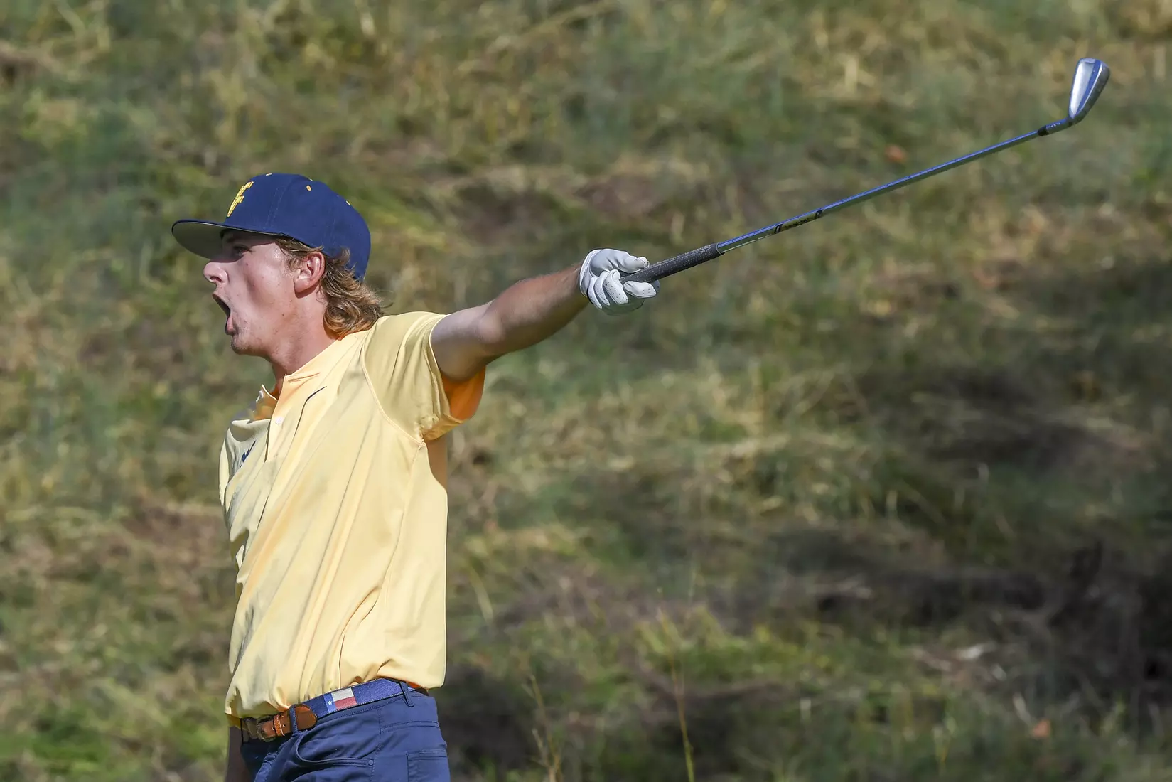Jackson Davenport watches his tee shot go left.