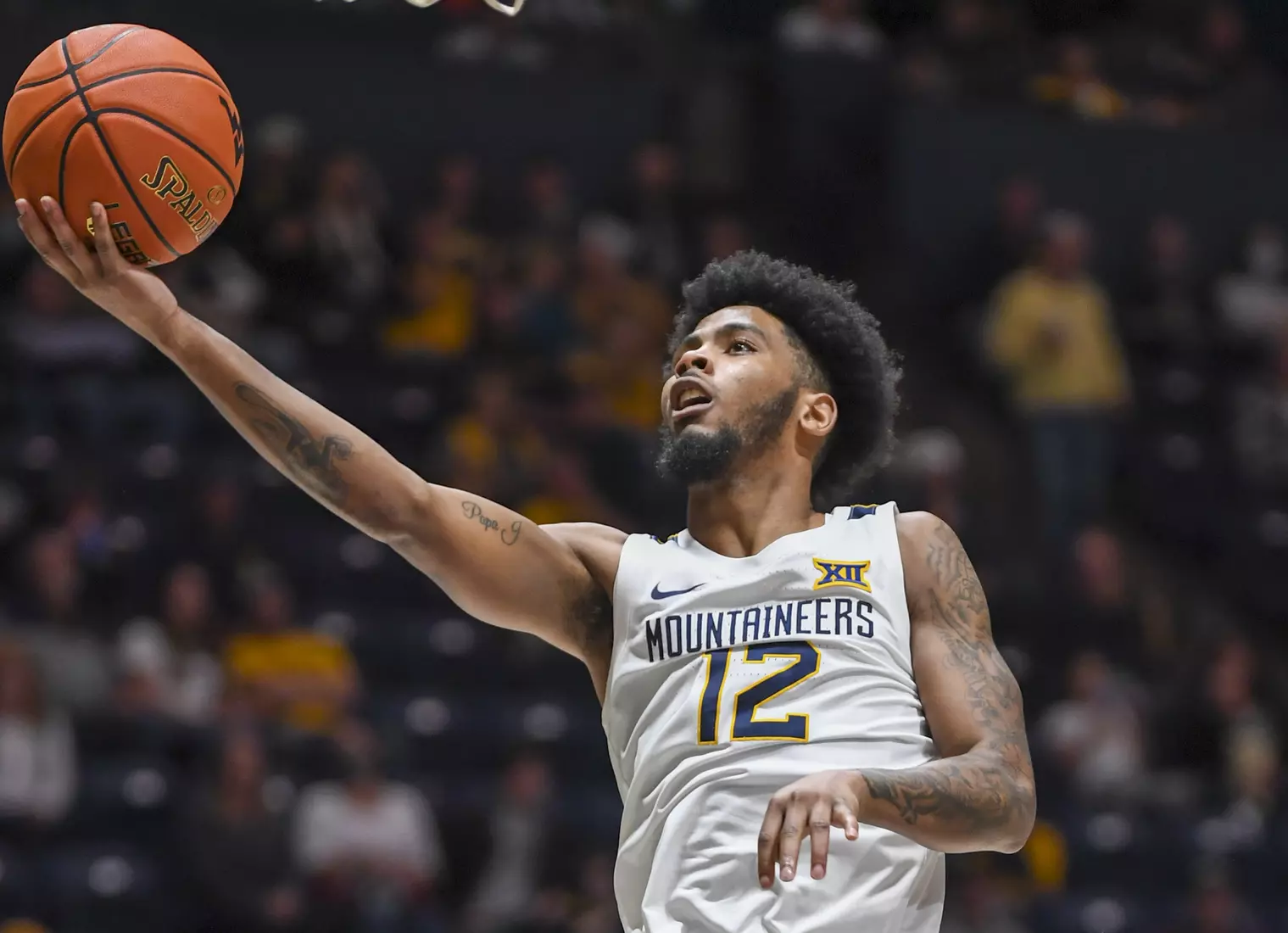 Taz Sherman scores two of his 29 points.