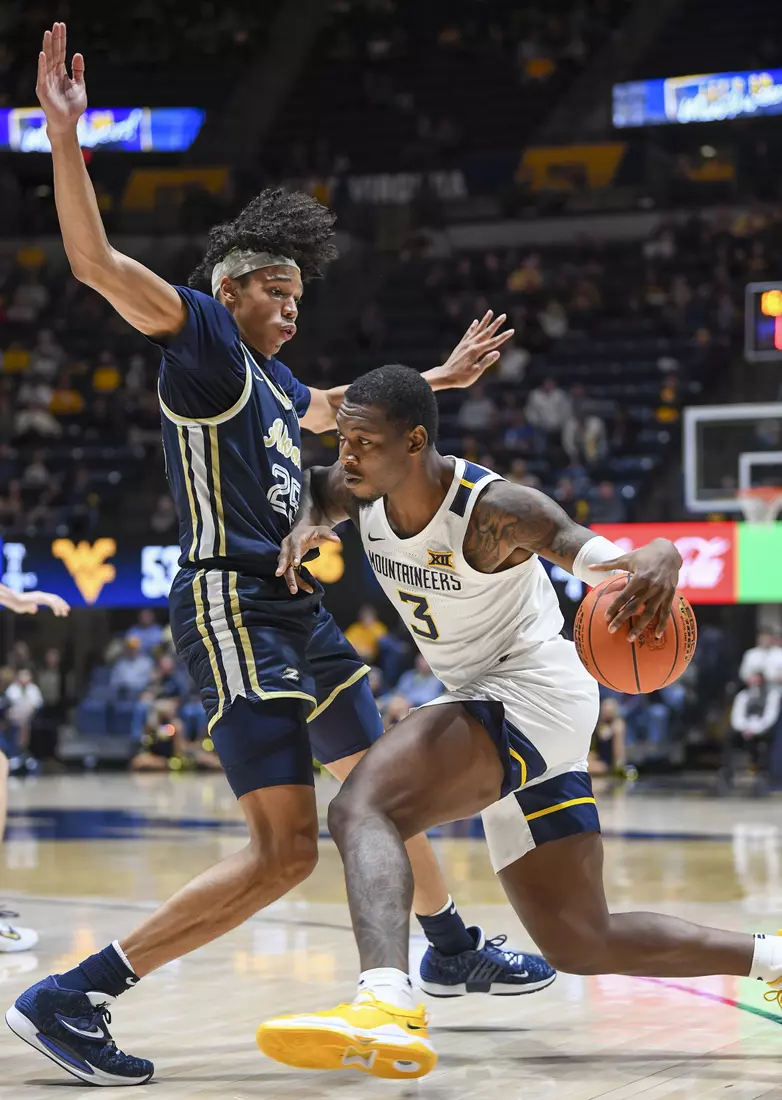 Gabe Osabuohien drives to the hoop.