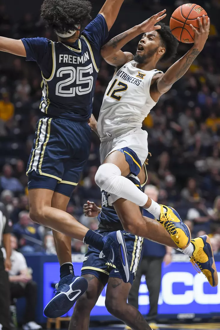 Taz Sherman drives the lane.