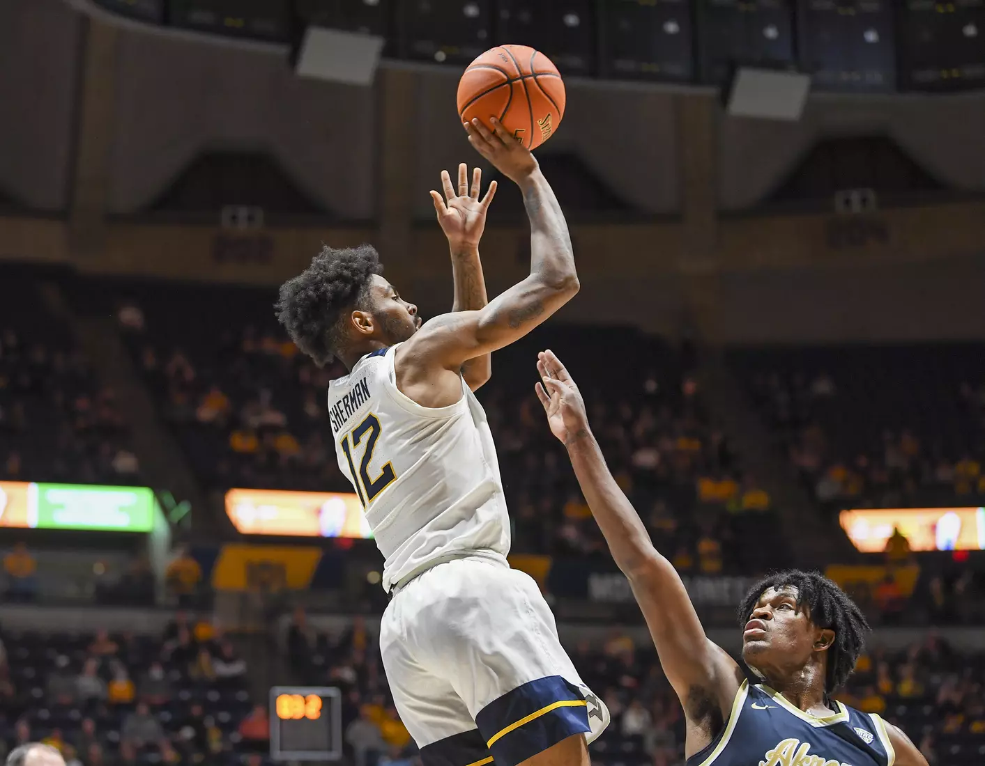 Taz Sherman hits a three.