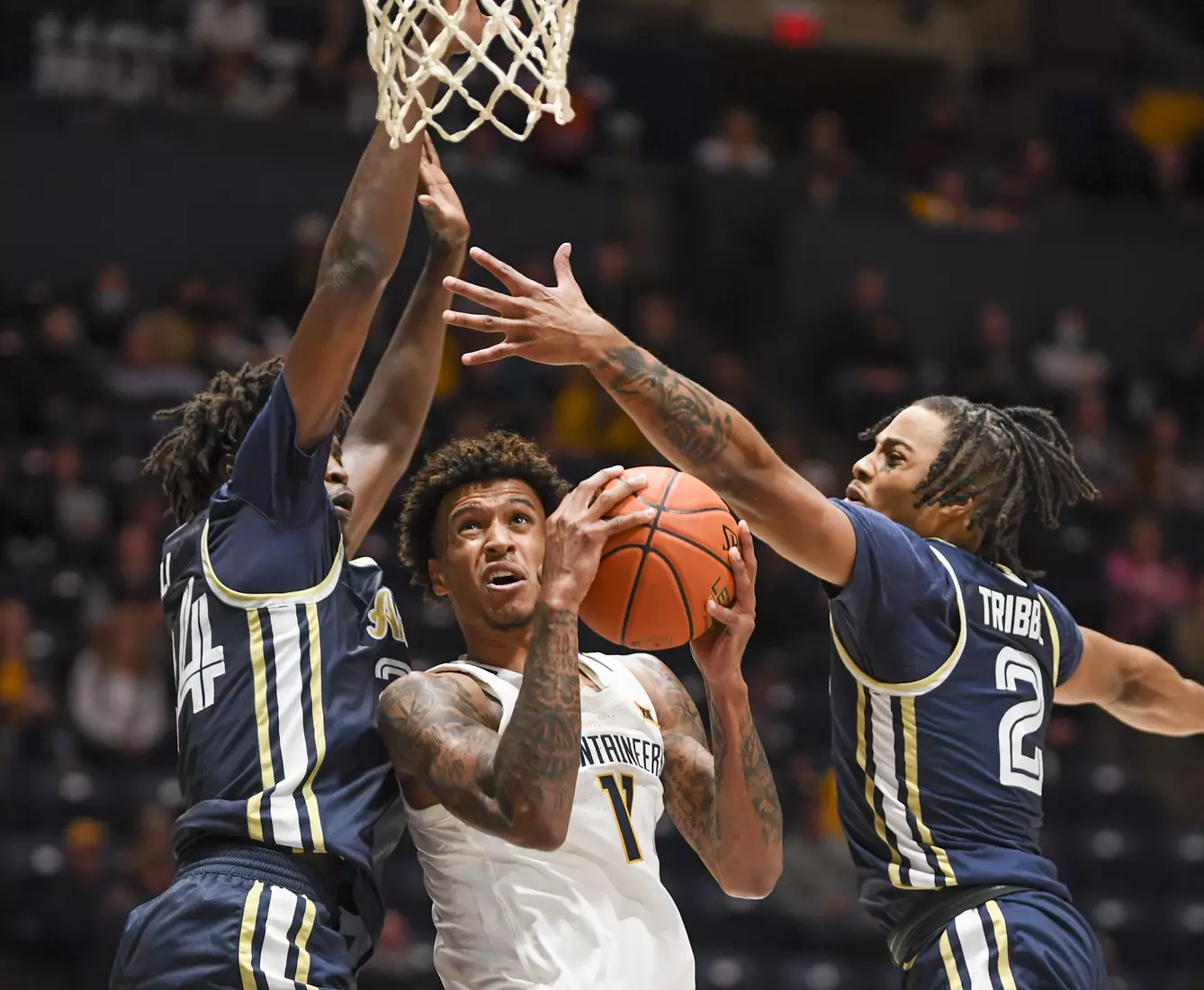 Jalen Bridges battles to the basket.