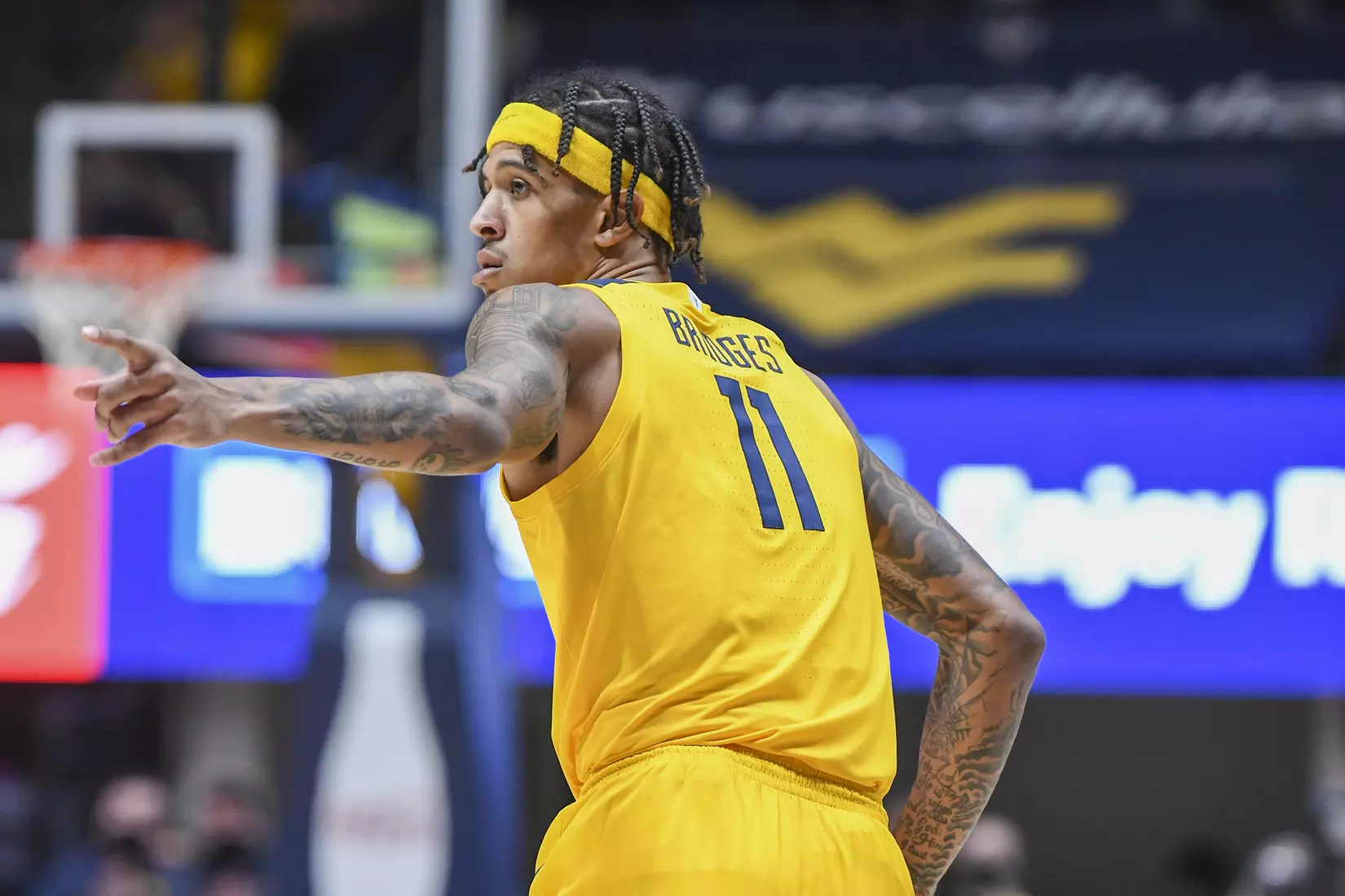 Jalen Bridges celebrates a three-pointer.