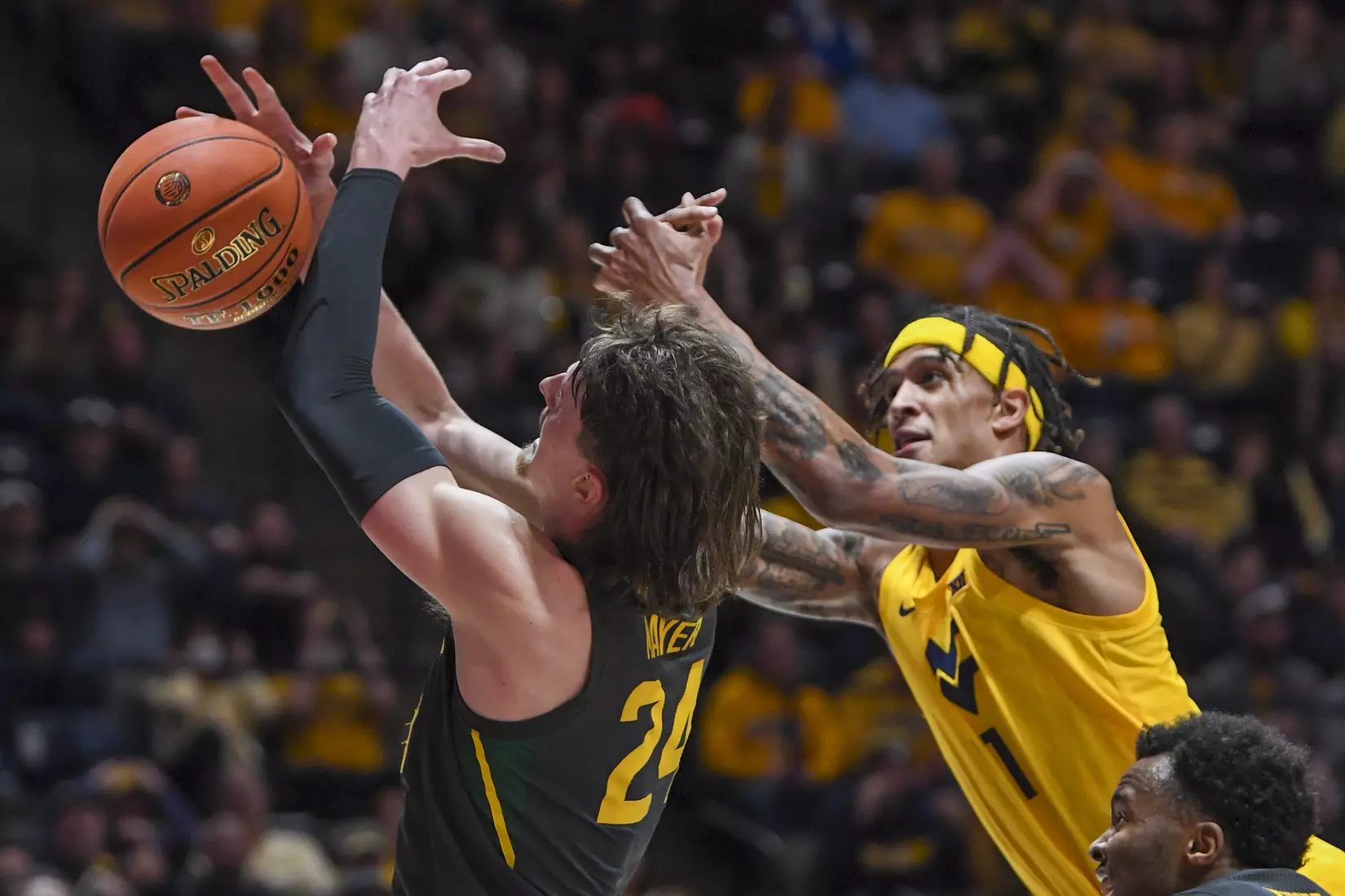 Jalen Bridges fights for a rebound.