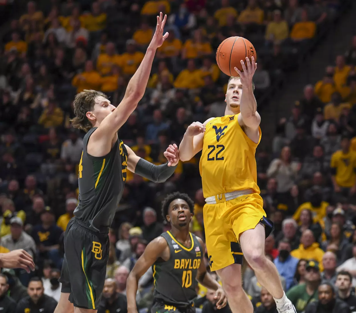 Sean McNeil drives on a layup.