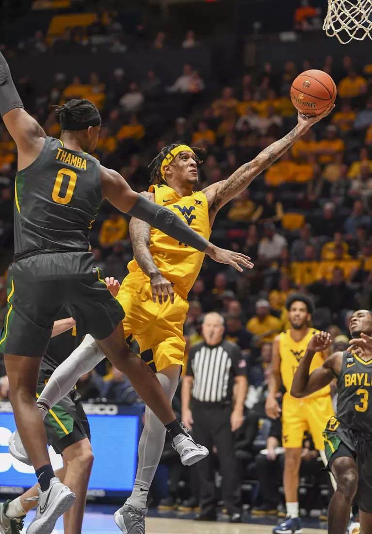 Jalen Bridges scoops and scores.