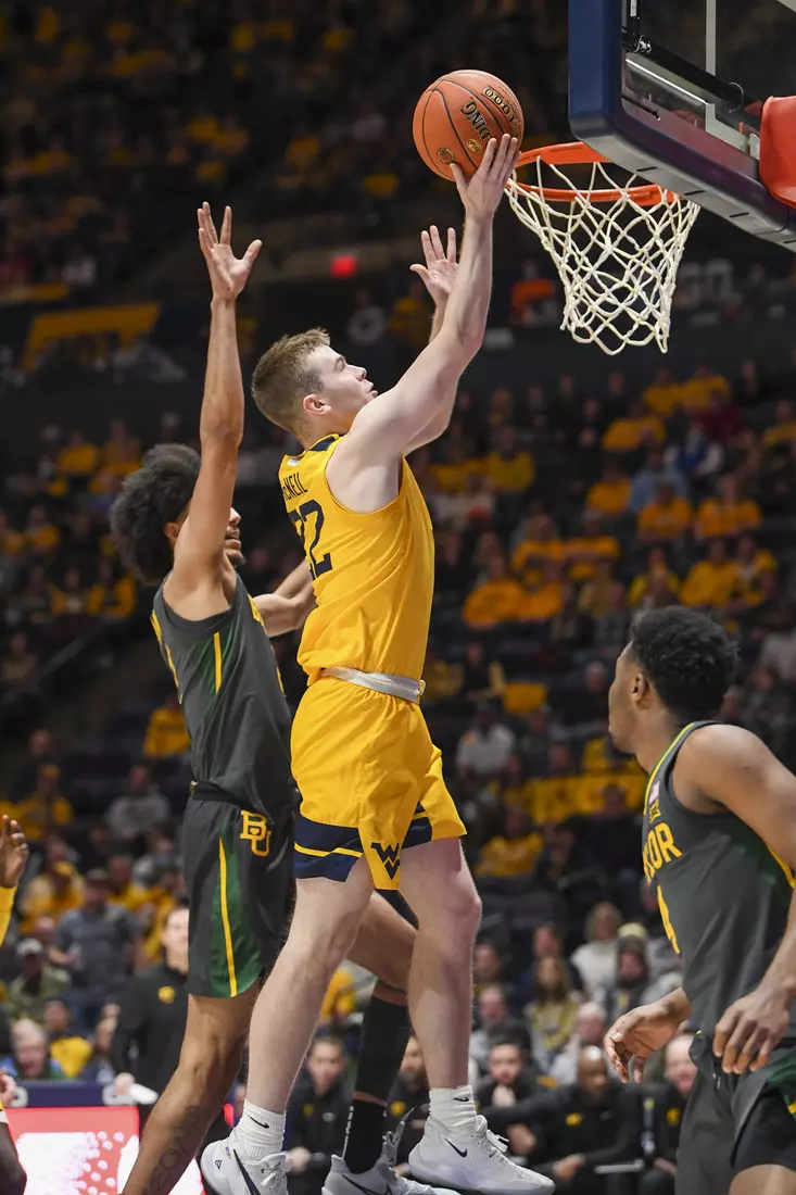 Sean McNeil drives on a layup.
