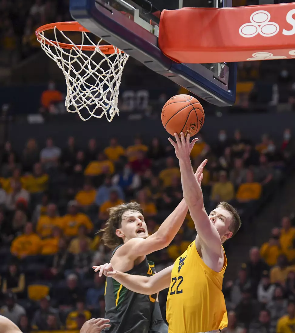 Sean McNeil drives on a layup.
