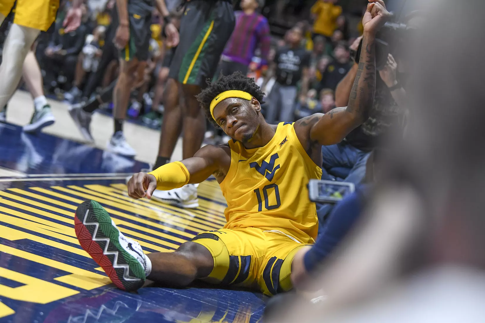 Malik Curry celebrates the basket and foul.