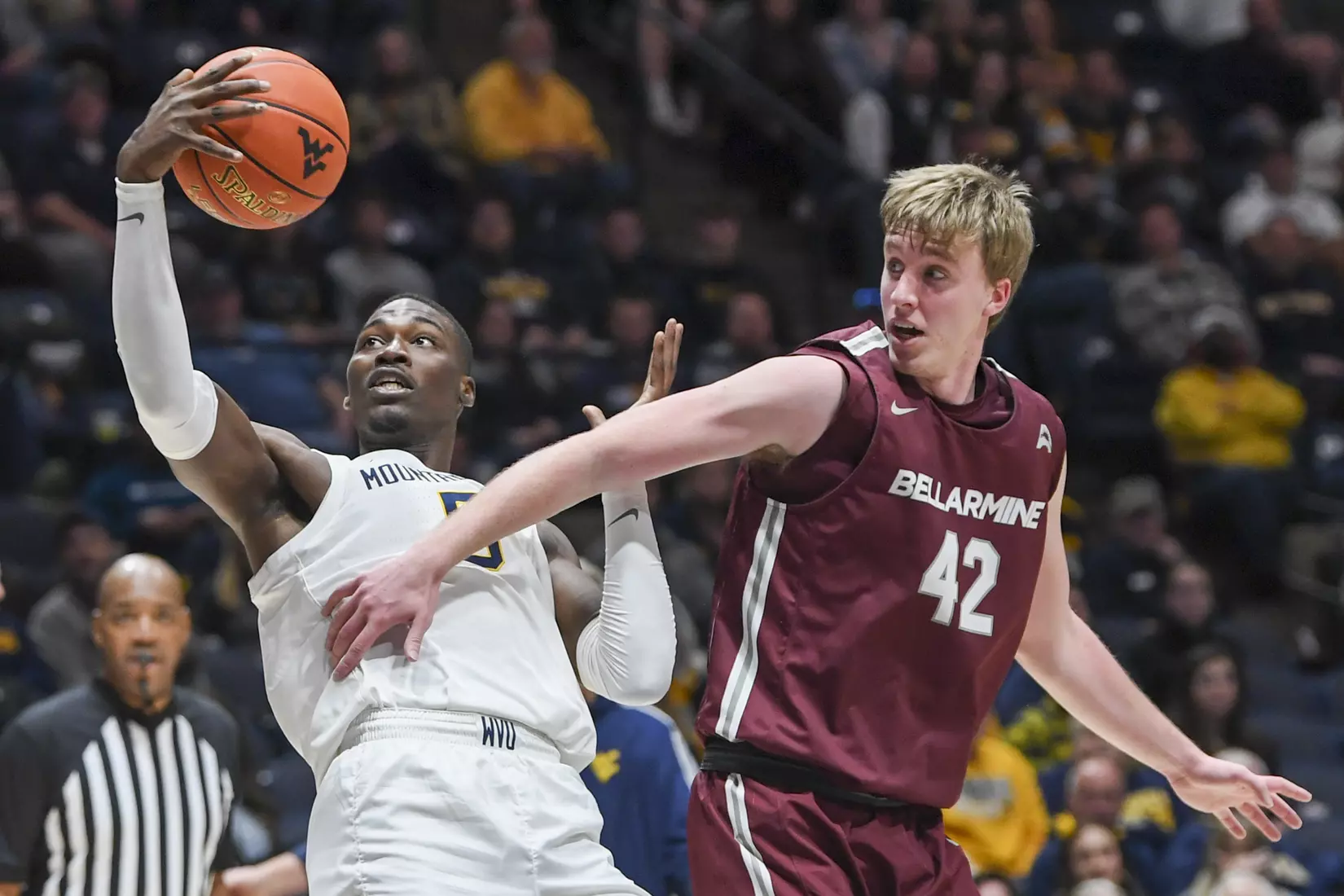 Dimon Carrigan rebounds.