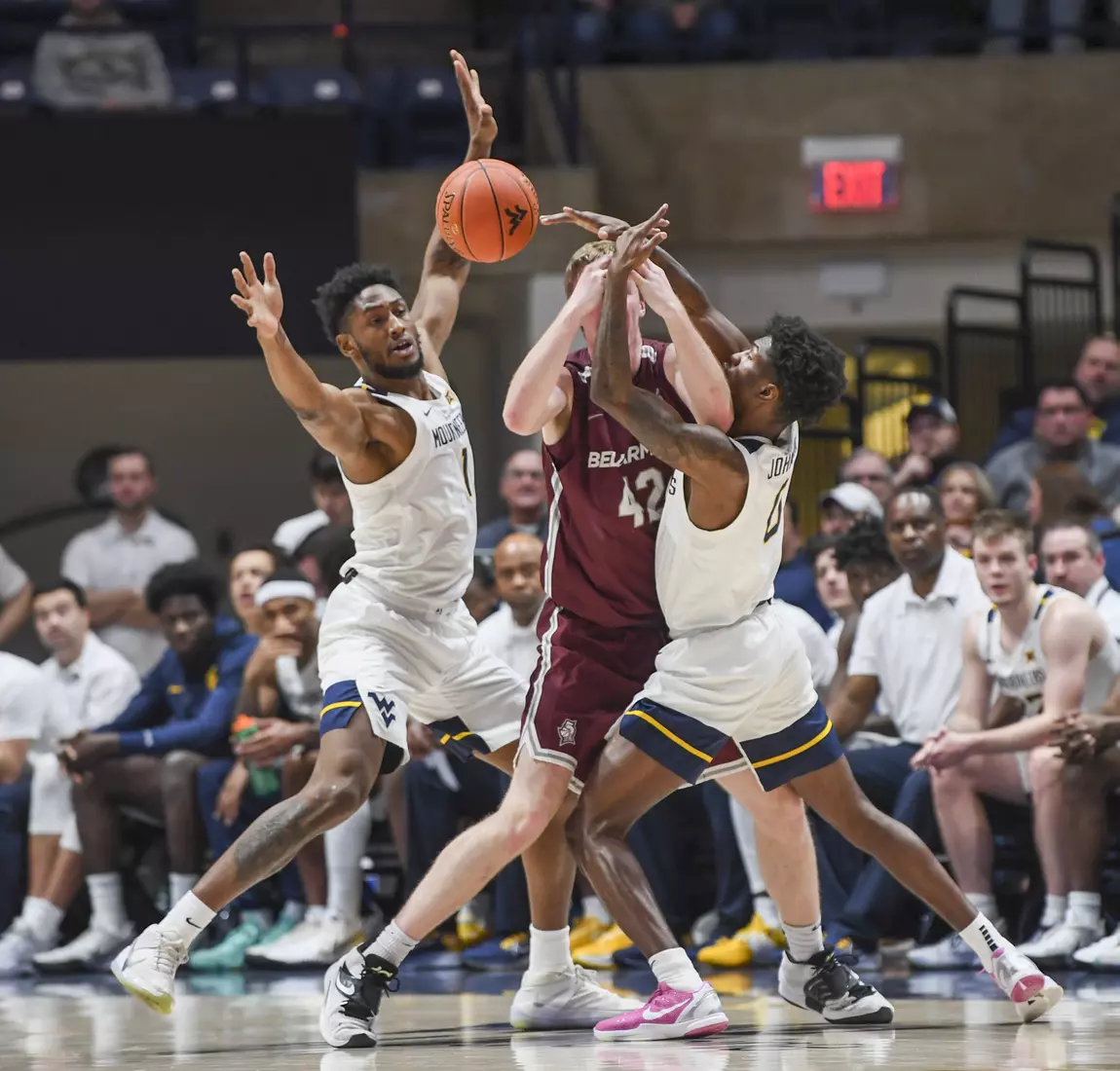 Kedrian Johnson and Pauly Paulicap defend.