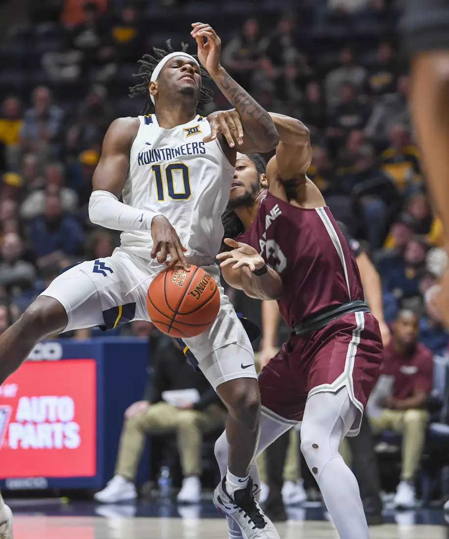 Malik Curry attempts a shot.