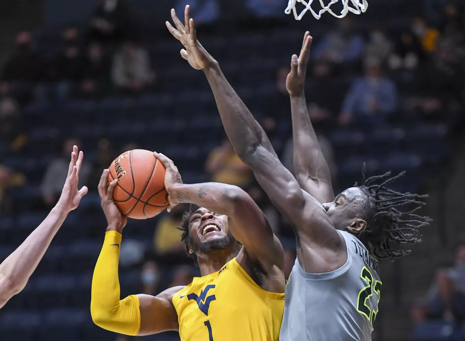 Derek Culver battles under the basket.