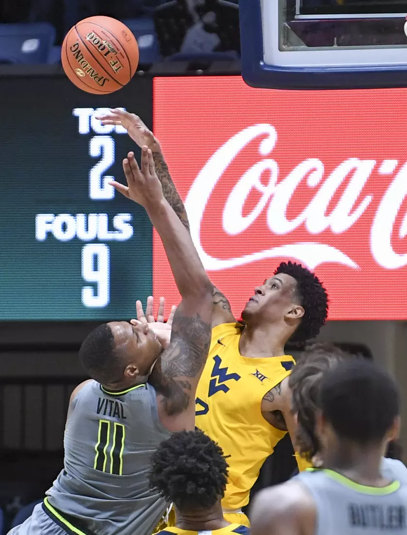 Jalen Bridges blocks a shot.