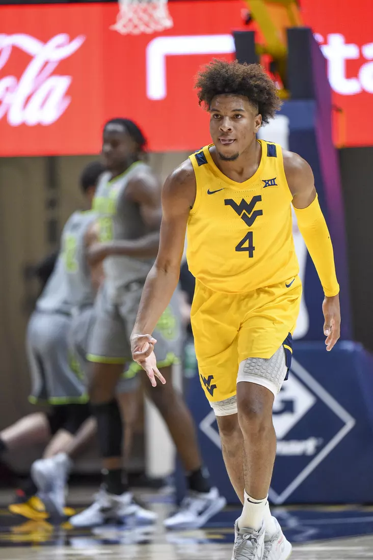 Miles McBride celebrates his three-pointer.
