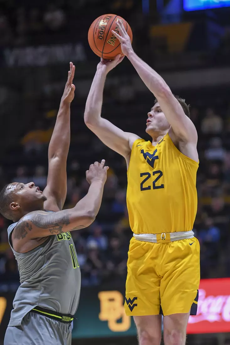 Sean McNeil hits a three-pointer.