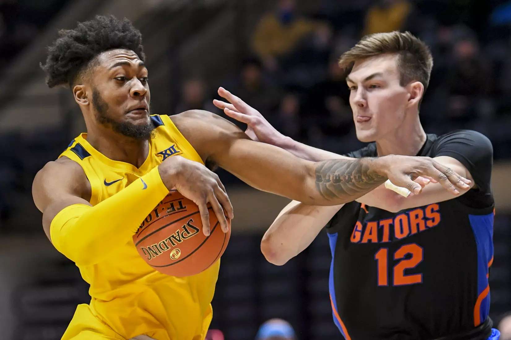 Derek Culver drives to the basket.