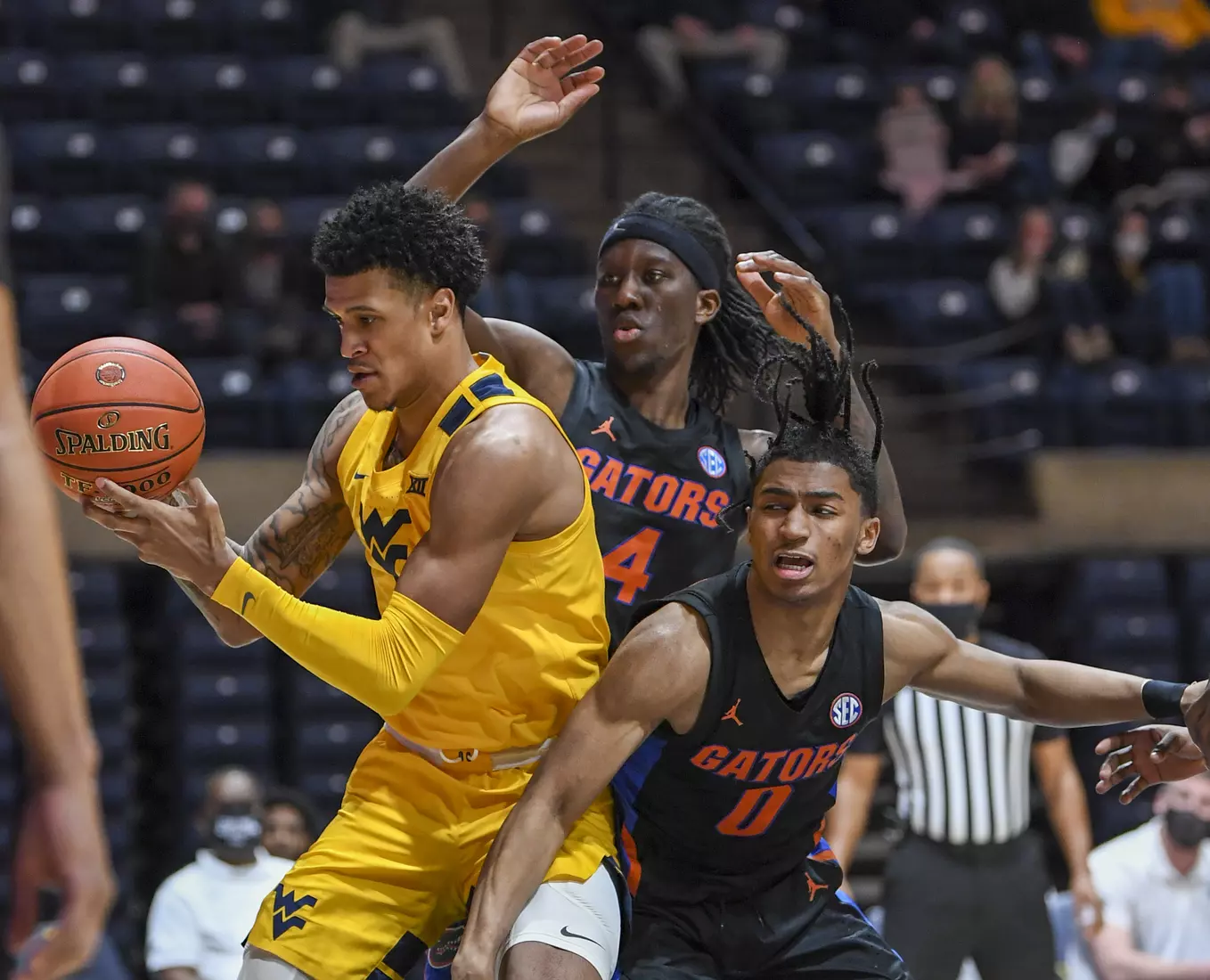 Jalen Bridges grabs an offensive rebound.