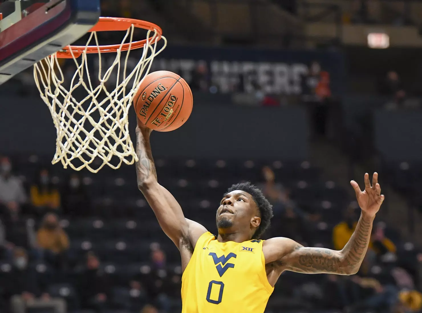 Kedrian Johnson heads to the basket for the slam.