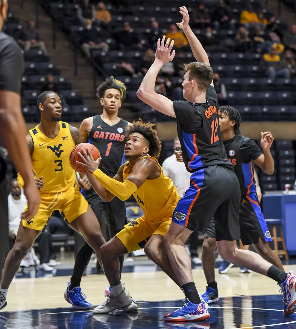 Miles McBride under the basket.