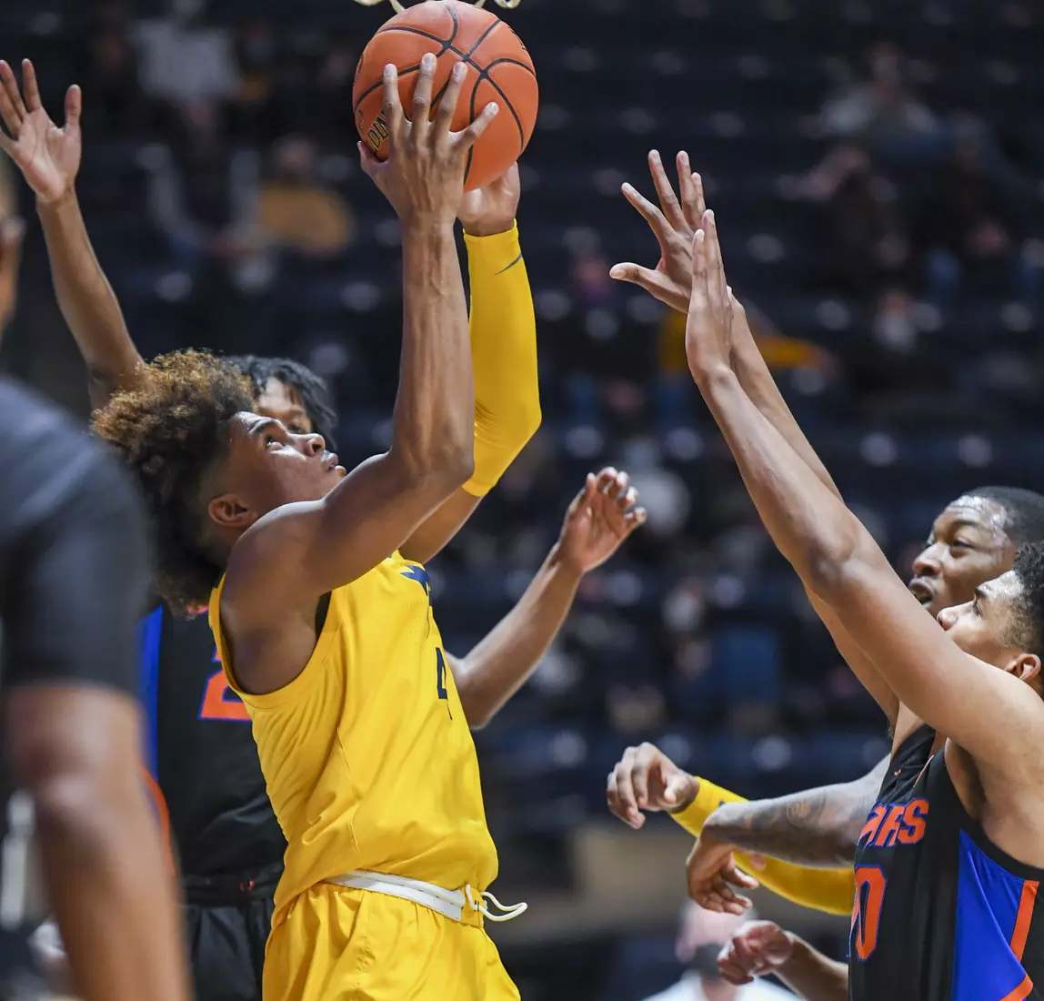 Miles McBride under the basket.
