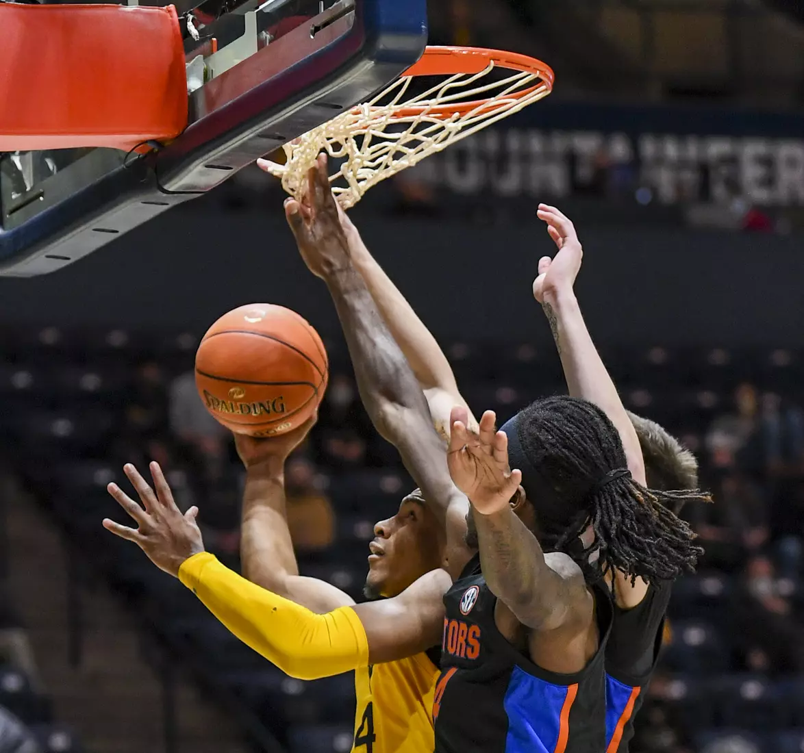 Miles McBride under the basket.