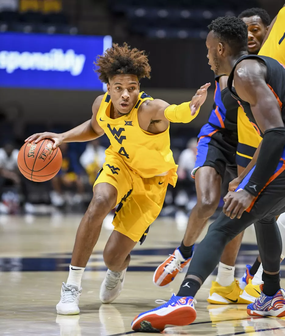 Miles McBride drives to the basket.