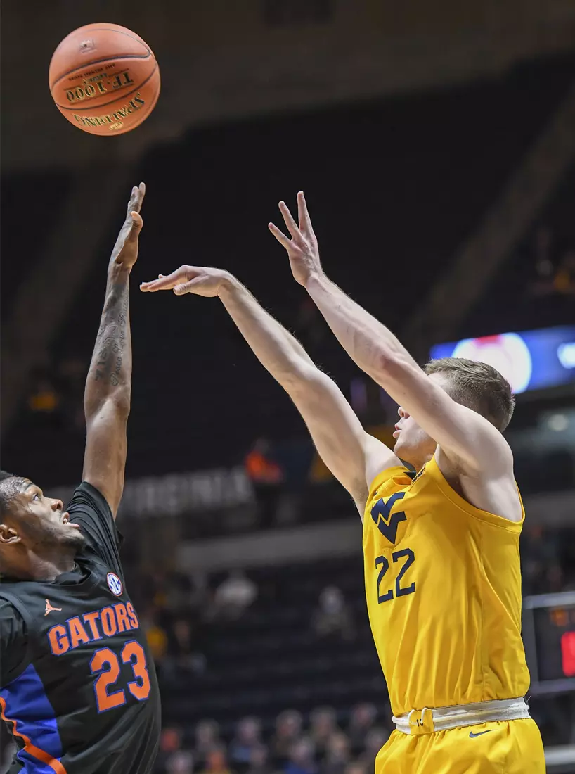 Sean McNeil hits a three-pointer.