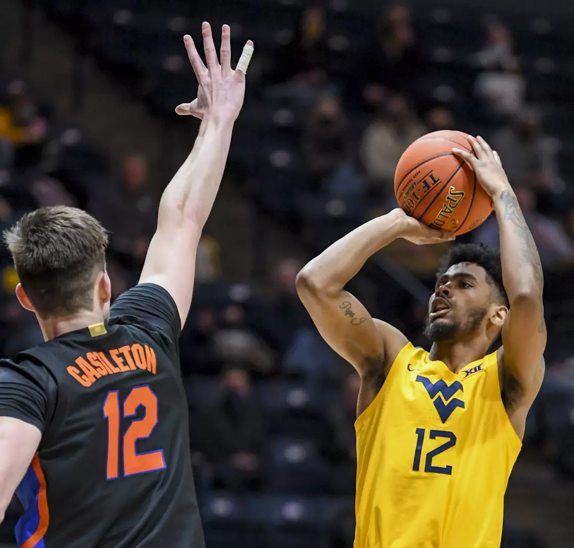 Taz Sherman shoots for two points.