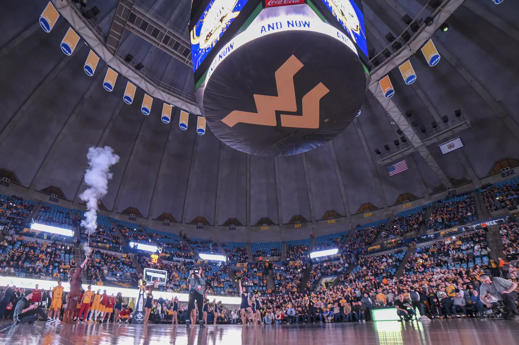 Mountaineer mascot Timmy Eads fires the musket.