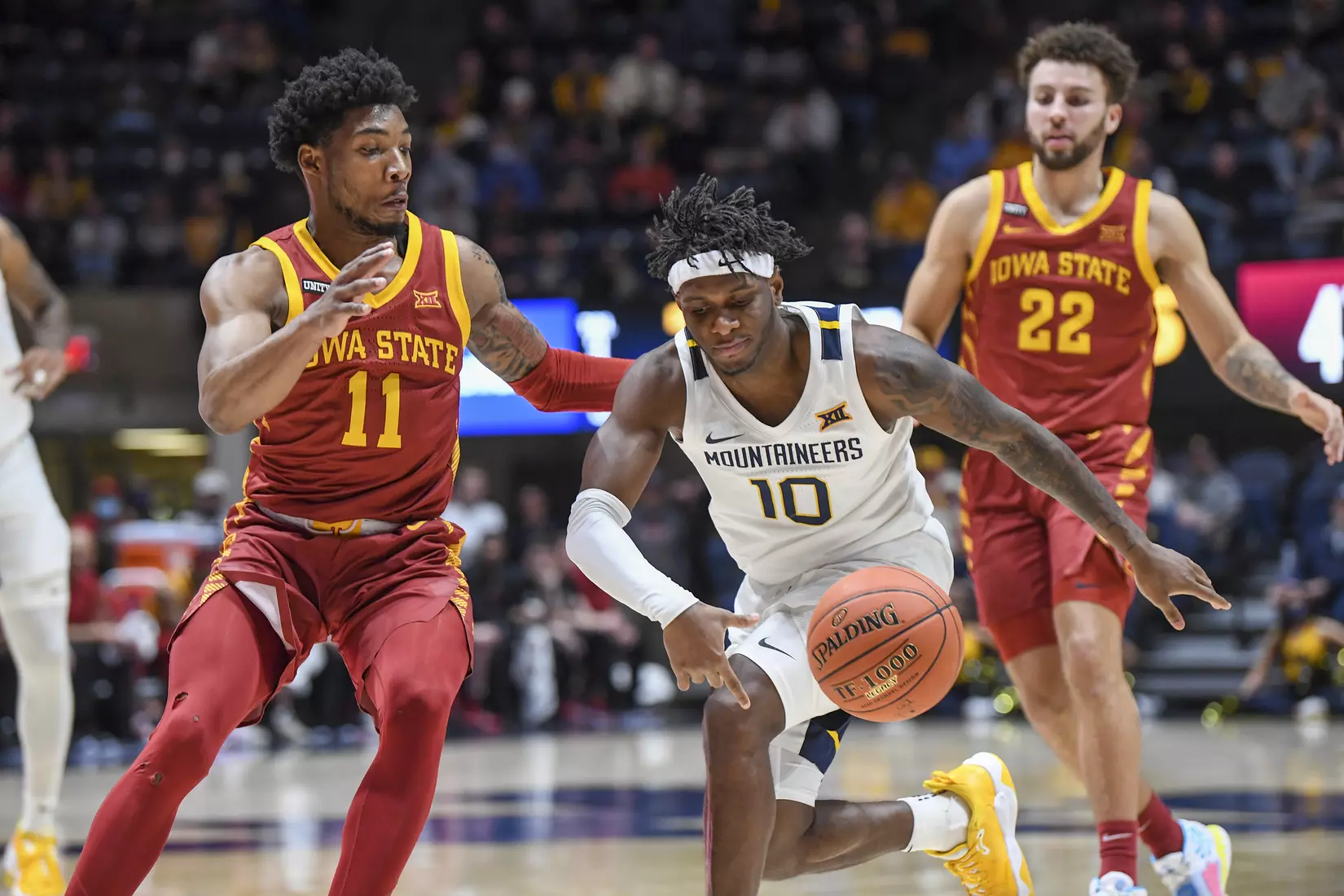 Bob Huggins and the Mountaineers celebrate the win with Country Roads.