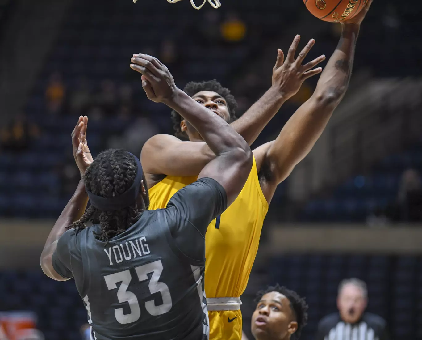 Derek Culver shoots for two points.