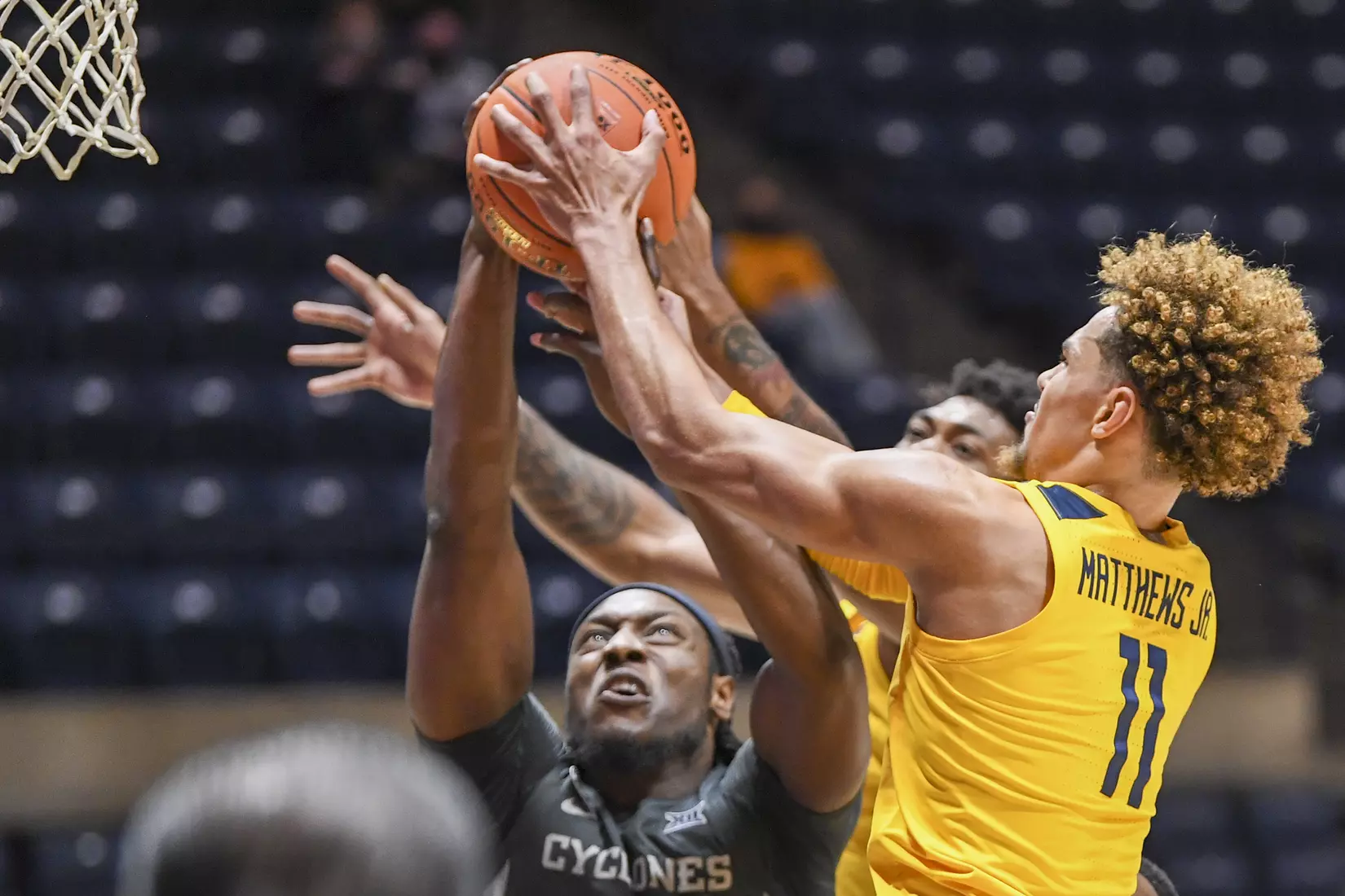 Emmitt Matthews Jr. goes up for the rebound.