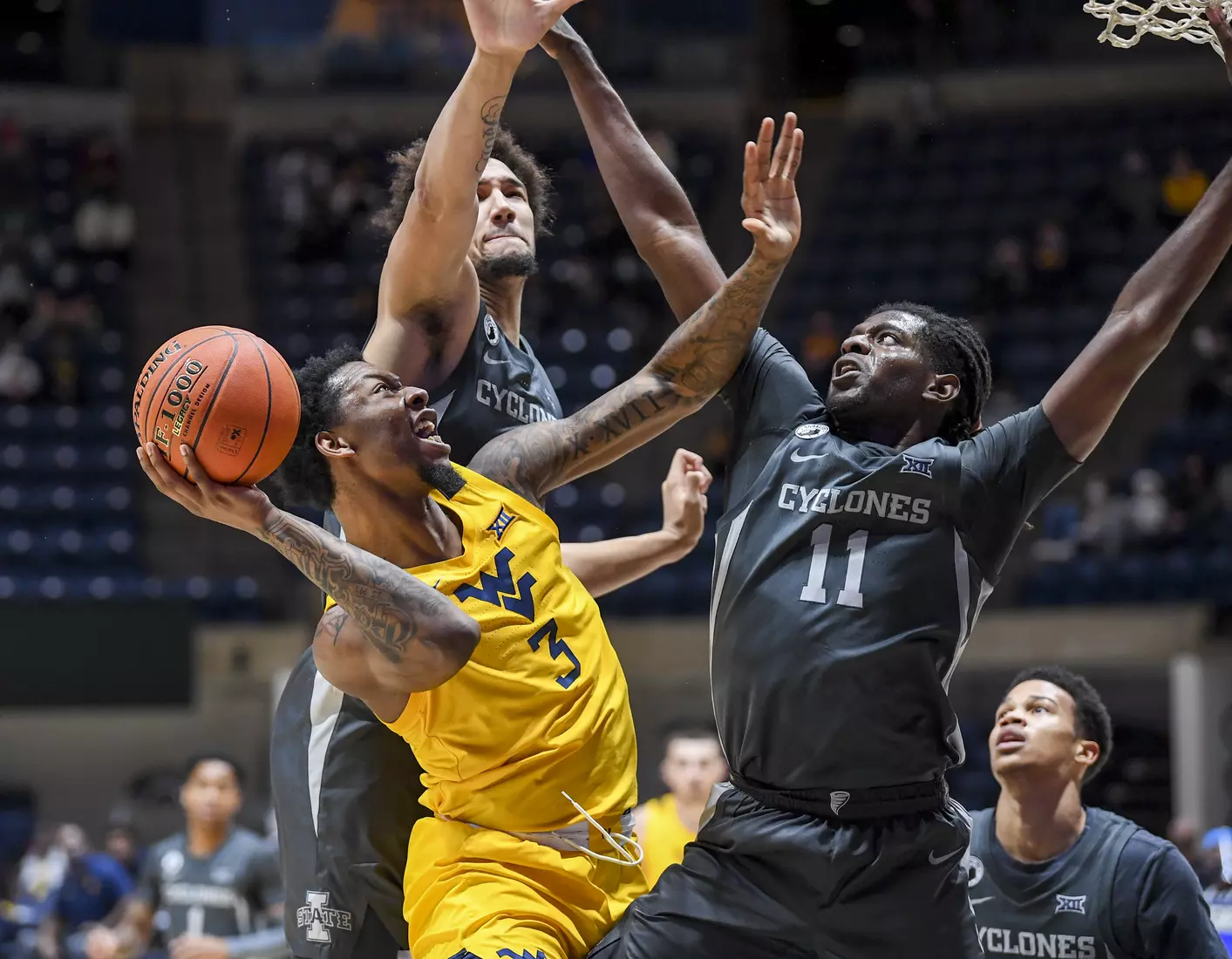 Gabe Osabuohien shoots in traffice.