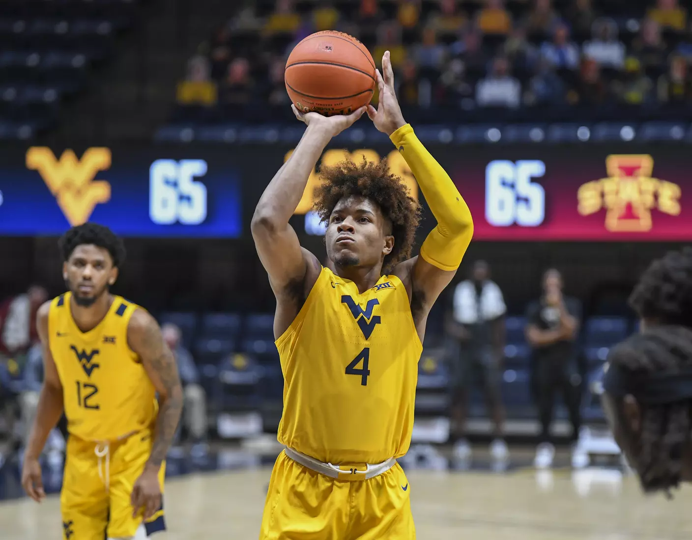Miles McBride shoots free throws late in the game.
